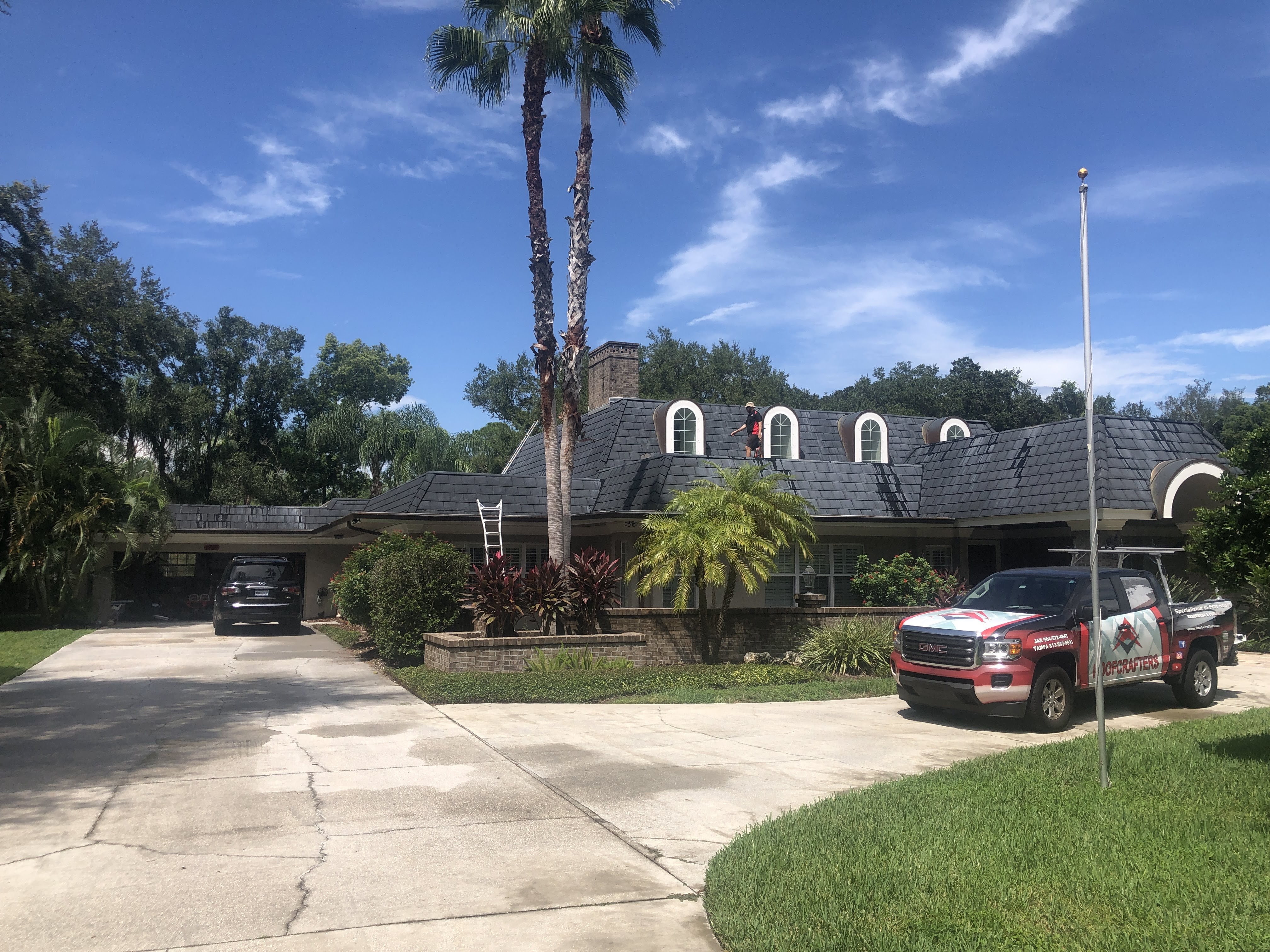 beautiful one story home with a metal shingle roof