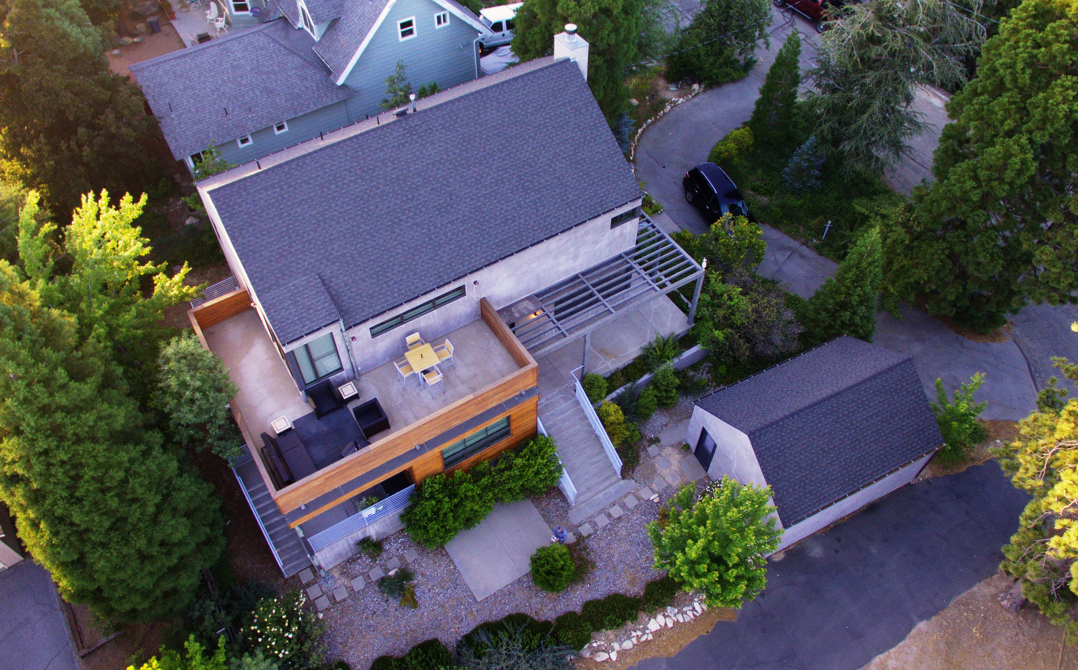 birds eye view of home with asphalt shingles