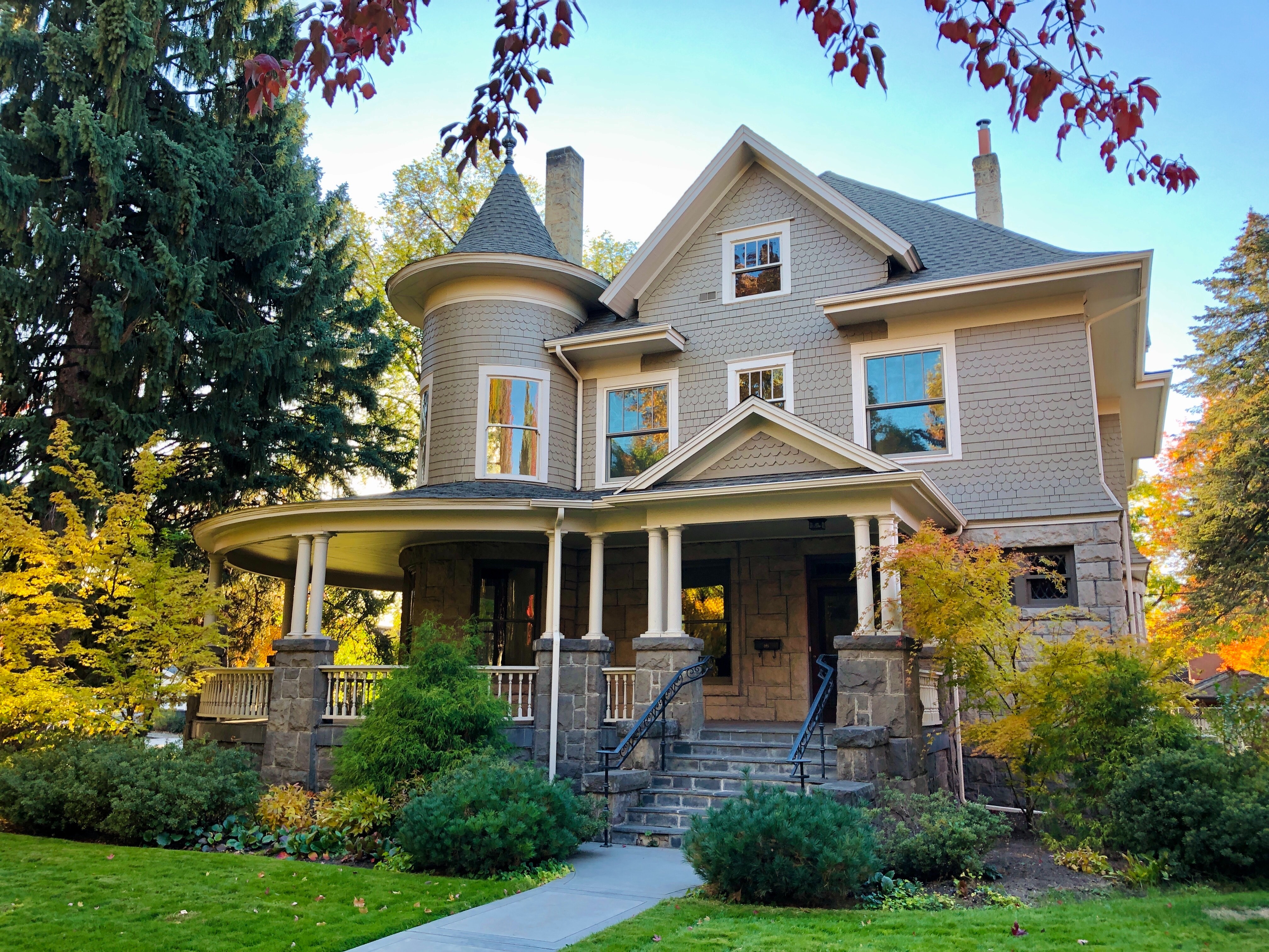victorian style home with asphalt shingles