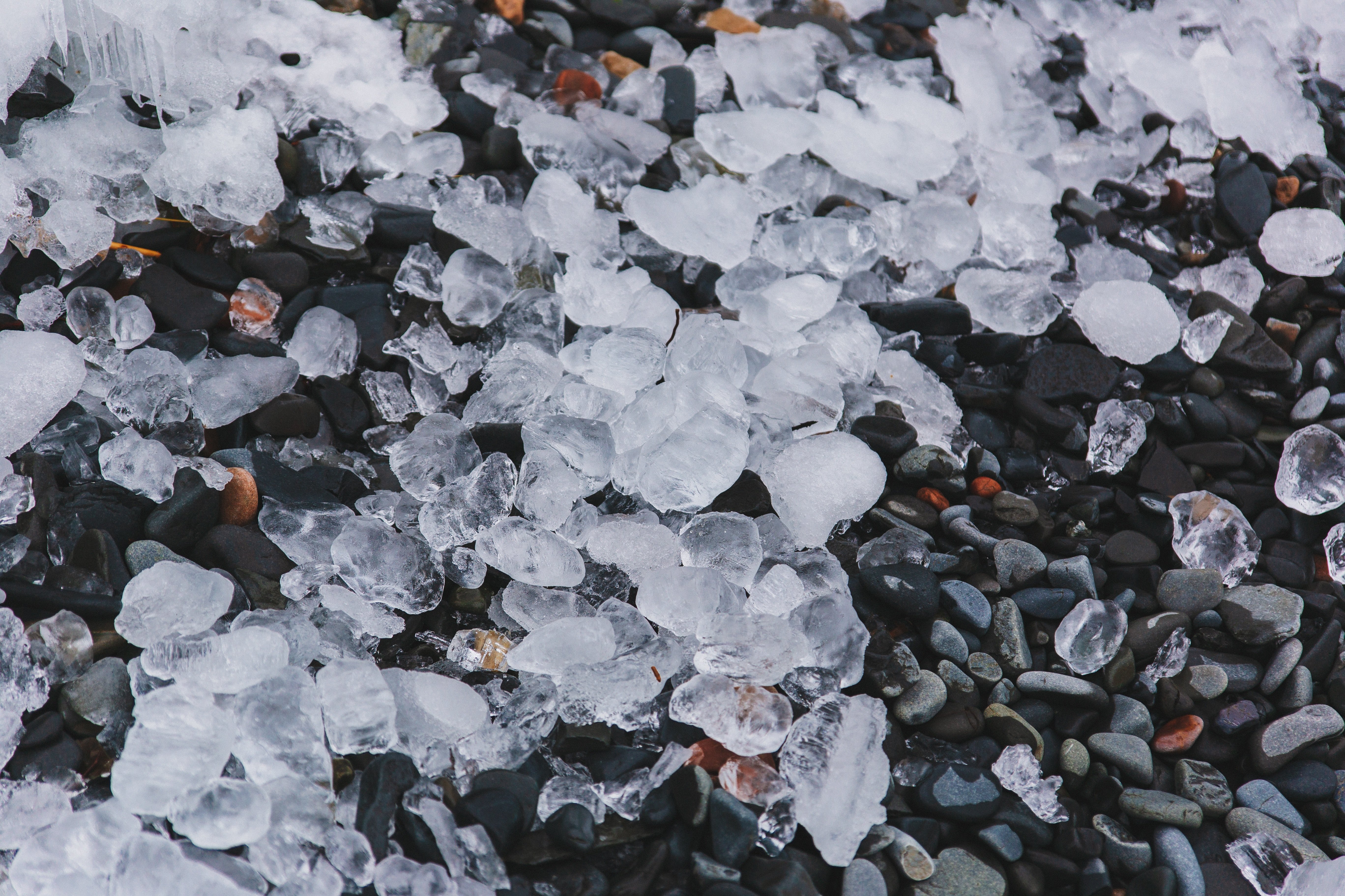 hail collecting on pebbles