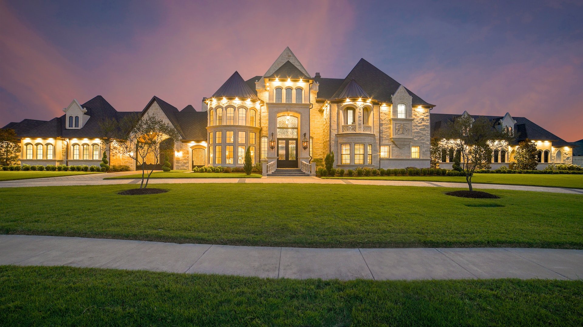 mansion with asphalt shingle roof