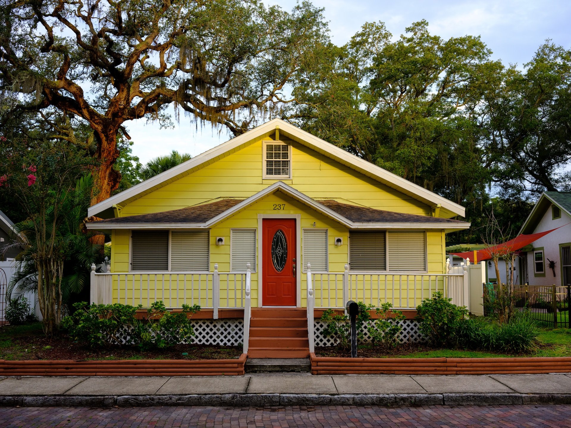 yellow house with red door
