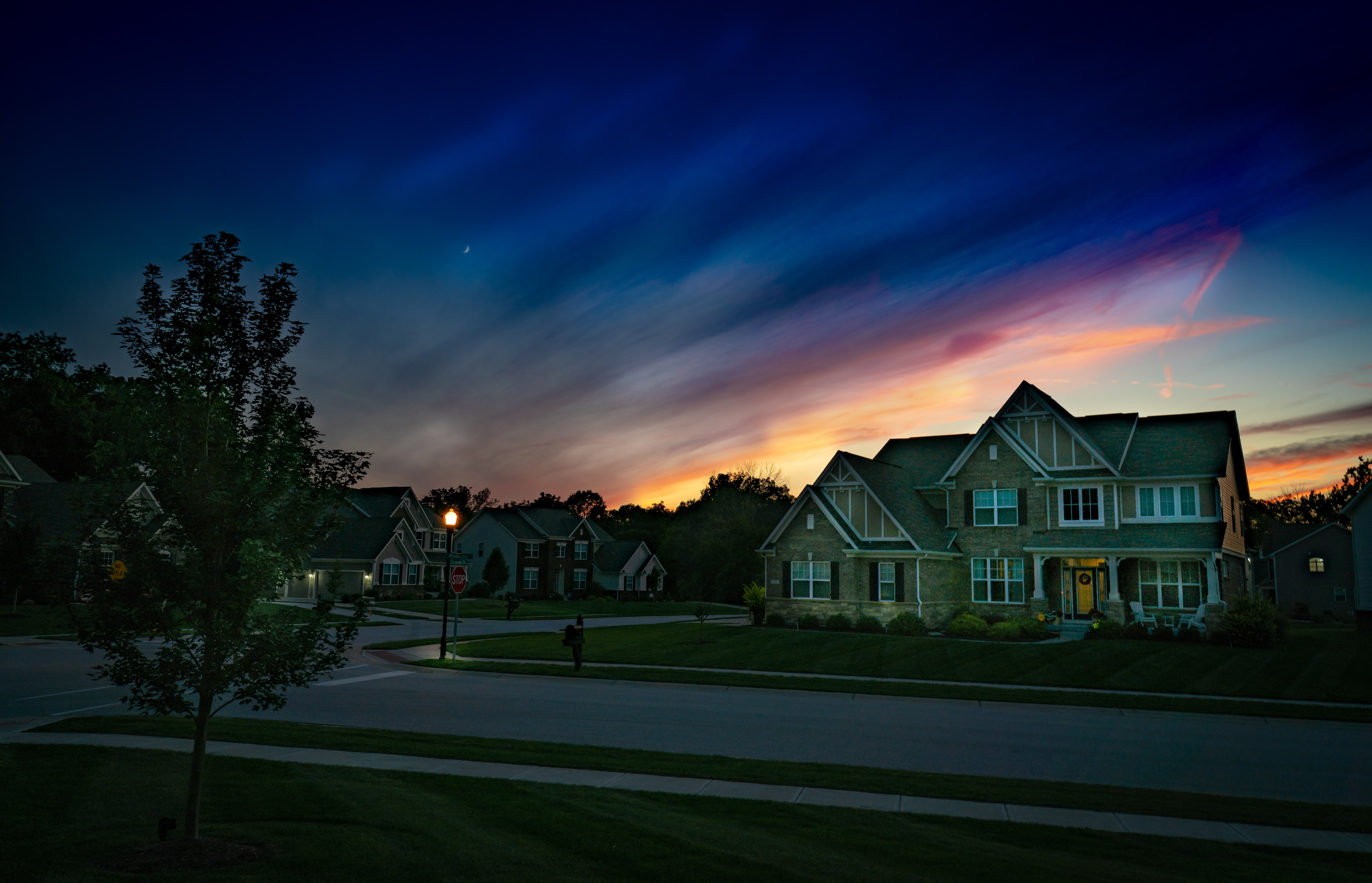 large home with asphalt shingles