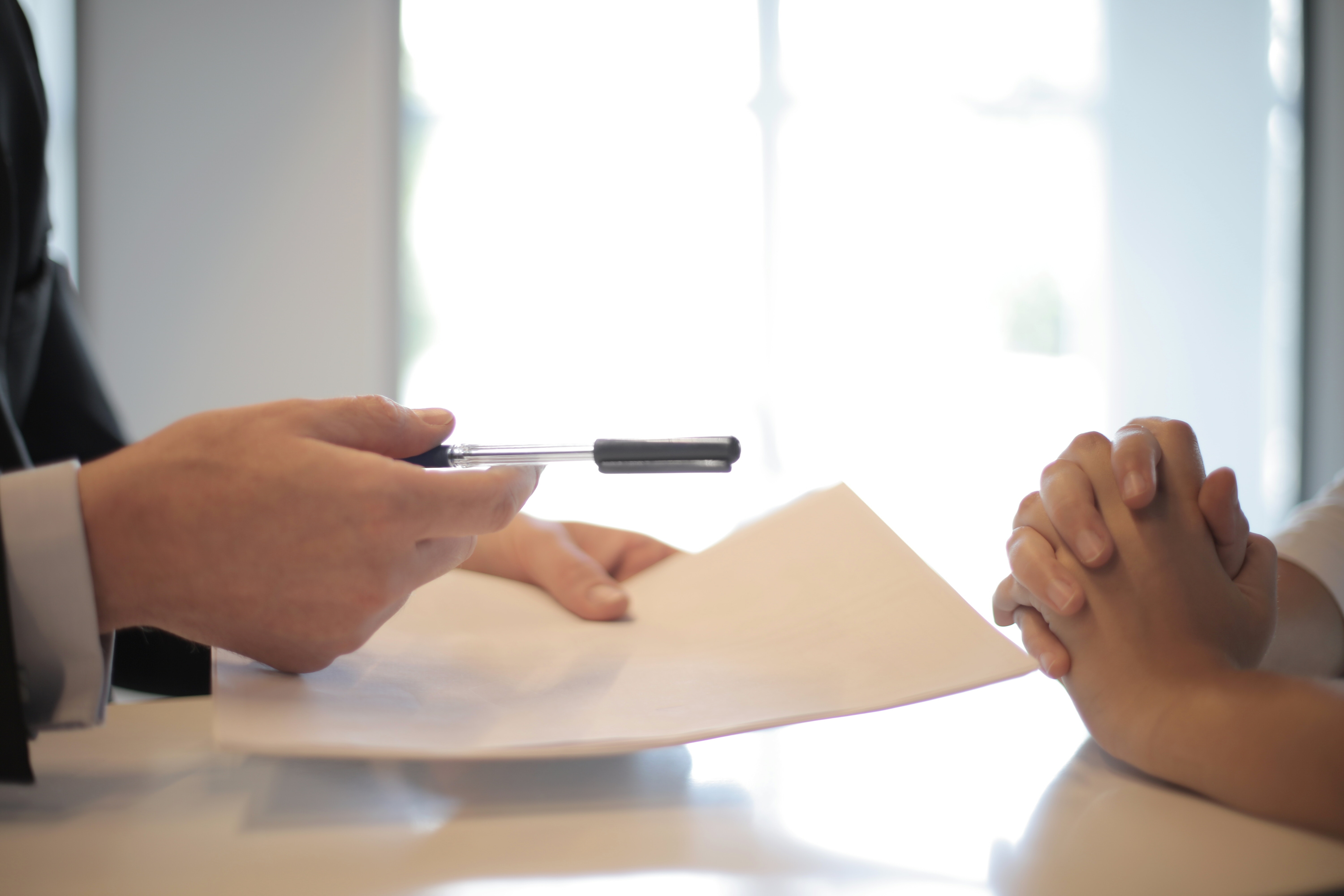 person signing warranty paperwork