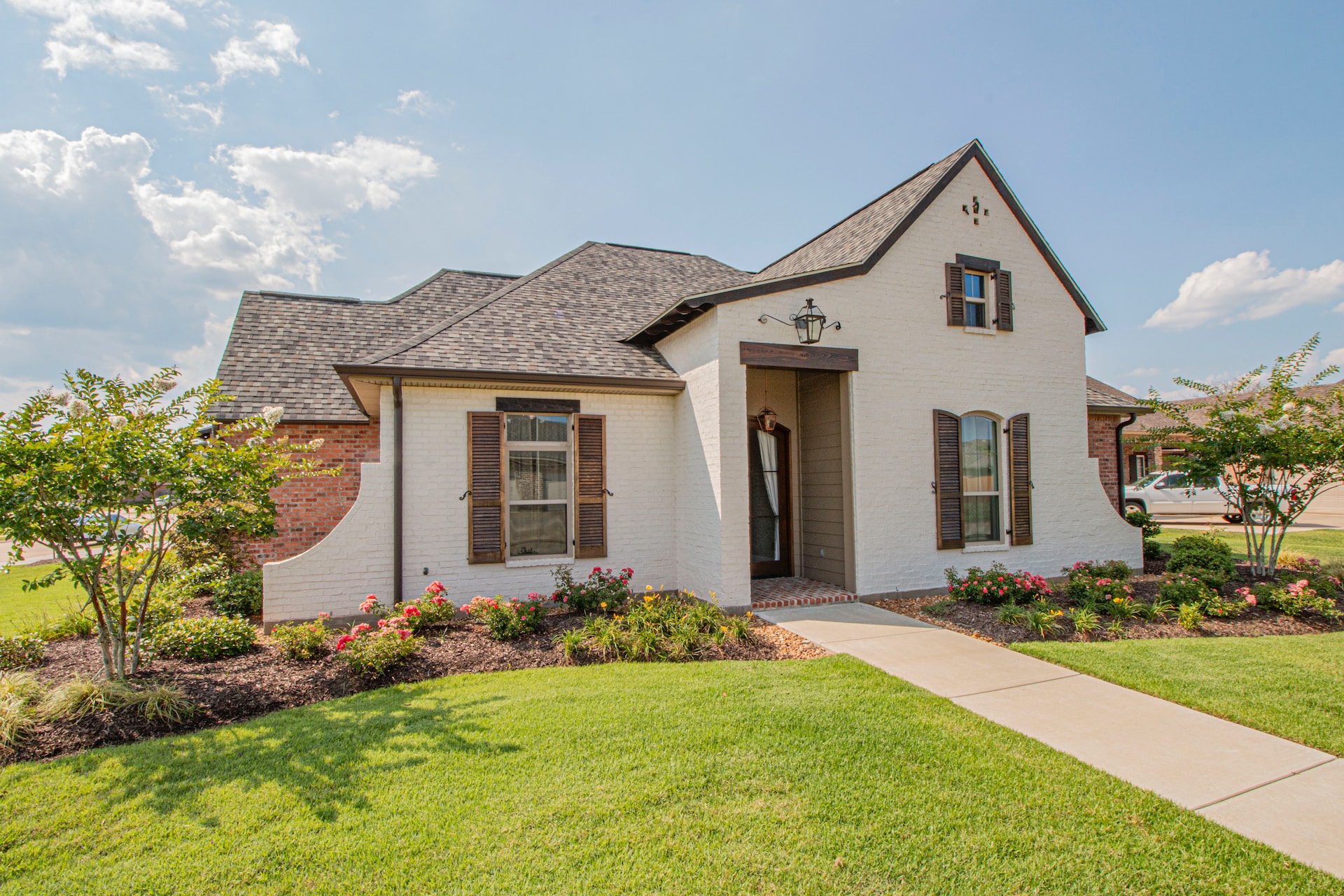 brown and white brick home