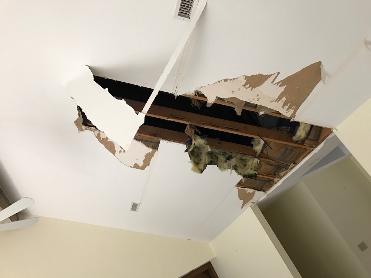 leaky roof causes ceiling collapse