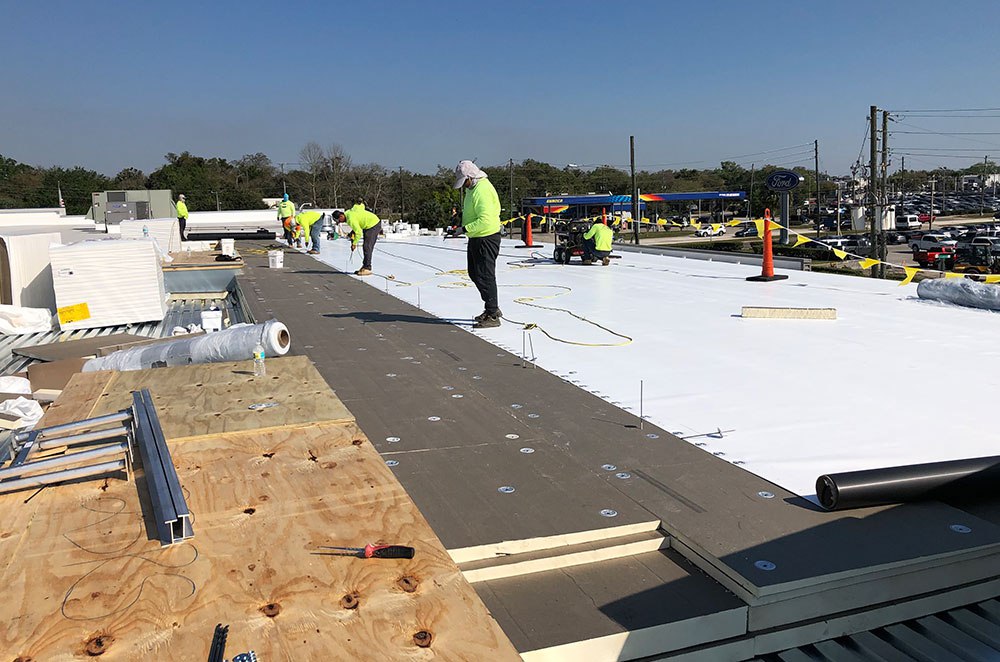 RoofCrafters team performing commercial roof replacement