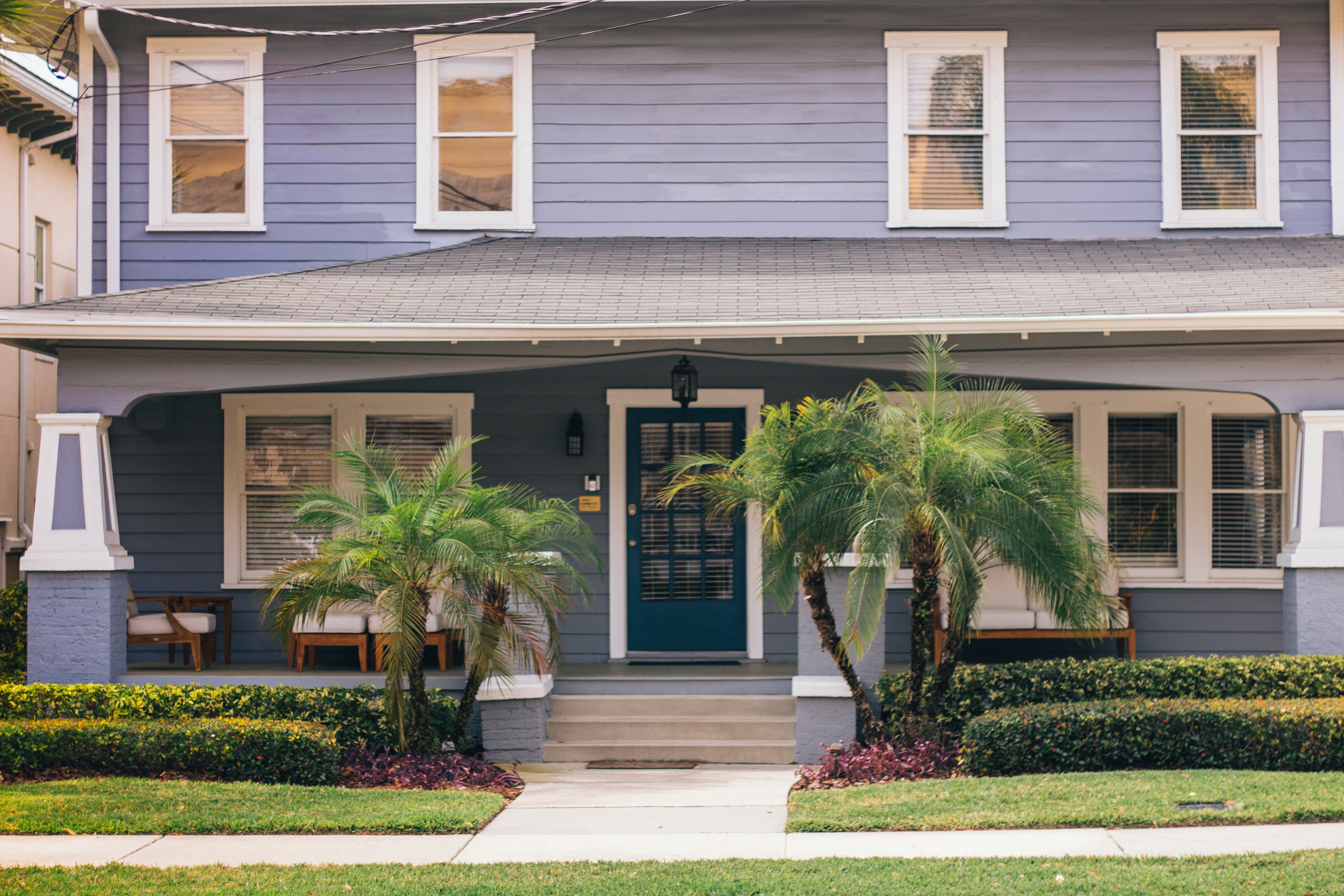 blue house with asphalt shingle roof